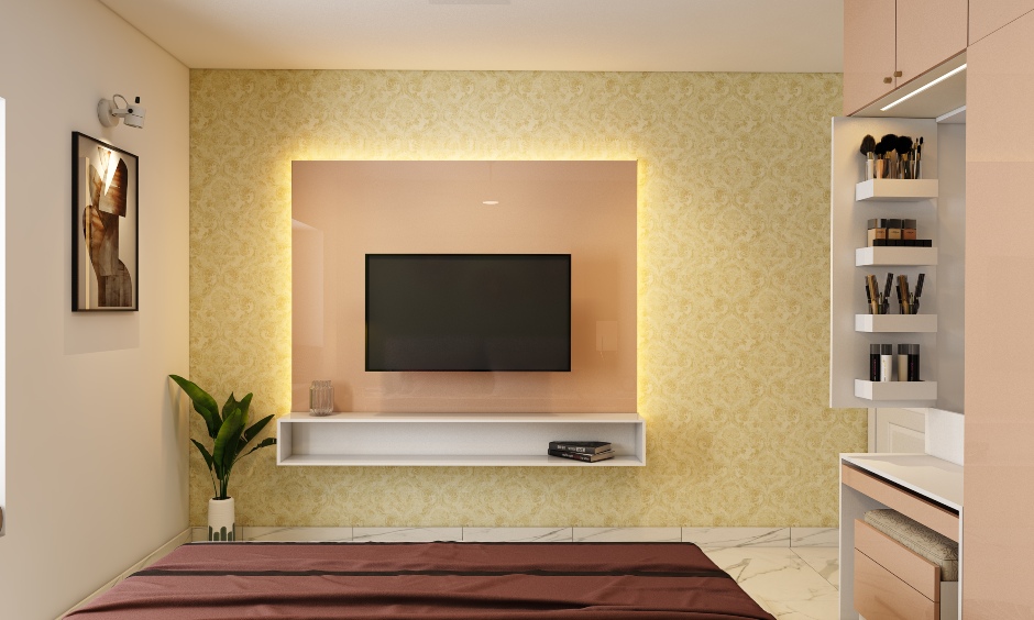 Wall-mounted bedroom tv unit design against gold wallpaper complements the olive green accent wall