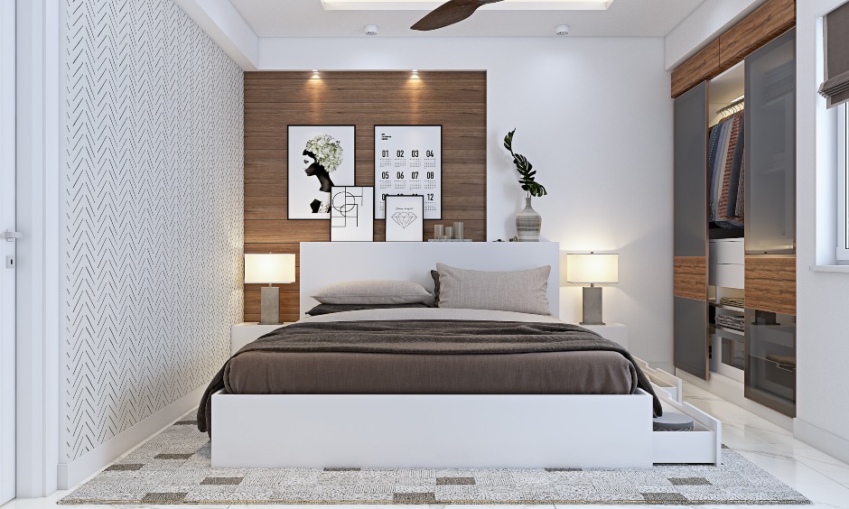 White bedroom with built-in wall wardrobe in 3 bhk flat interior design in bangalore