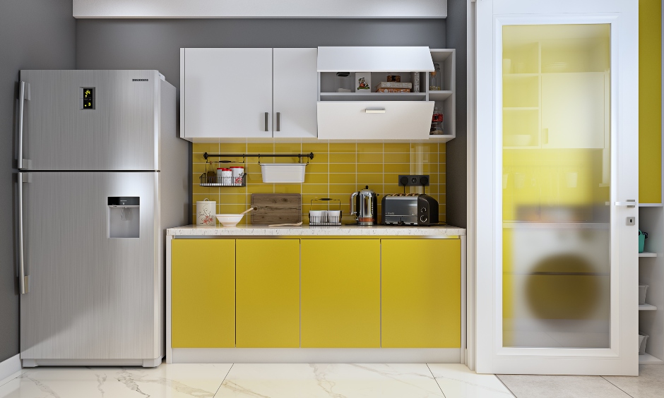 Parallel kitchen in yellow and white combination with crockery unit design for 3 bhk flat in hyderbad, mumbai and bengaluru